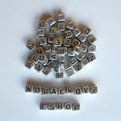 Černá písmenka - stříbrná kostička